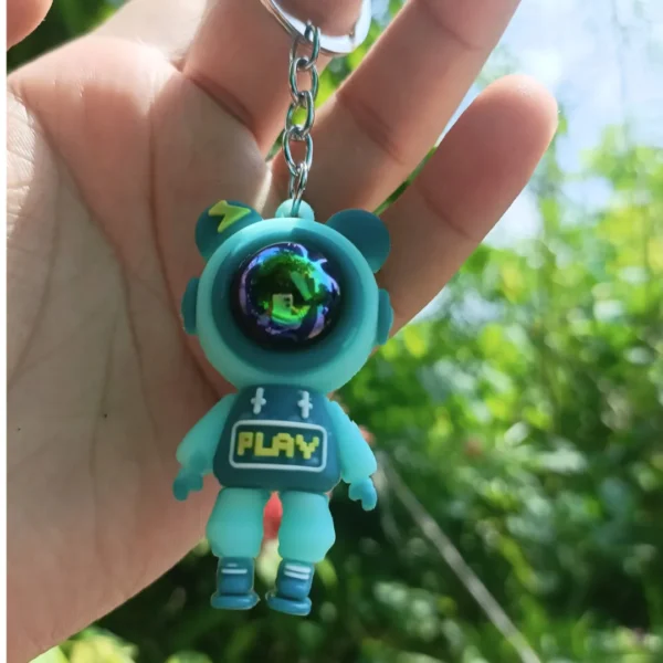 "Blue Astronaut Keychain with a cute astronaut design."