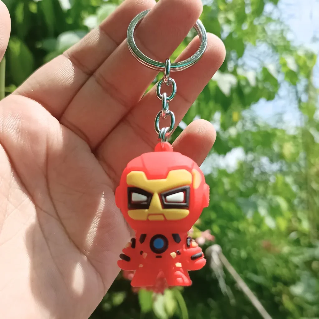 Small Iron Man Keychain featuring a bold design of the iconic superhero, perfect for bags