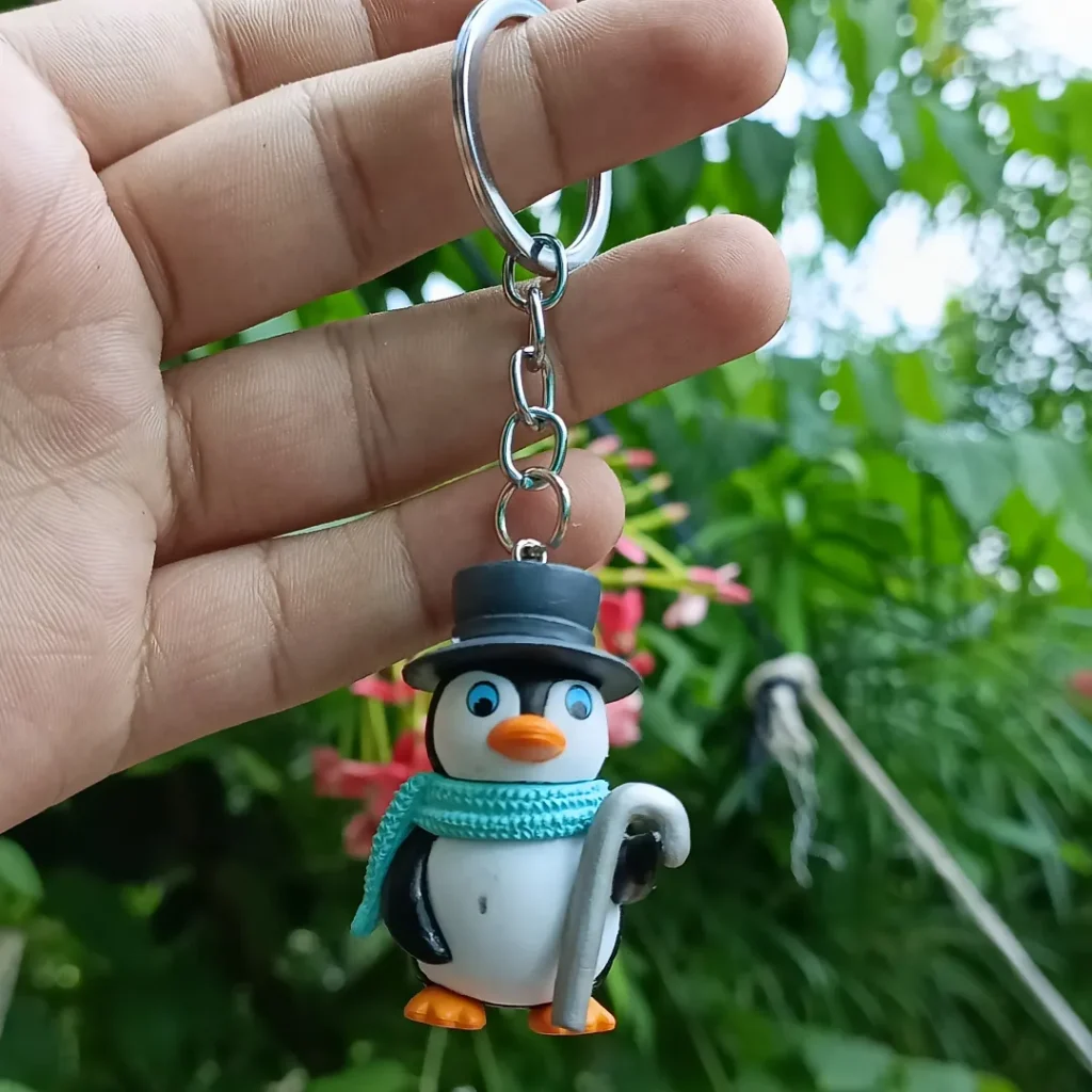 Penguin Keychain featuring a cute and colorful design of a penguin, perfect for animal lovers