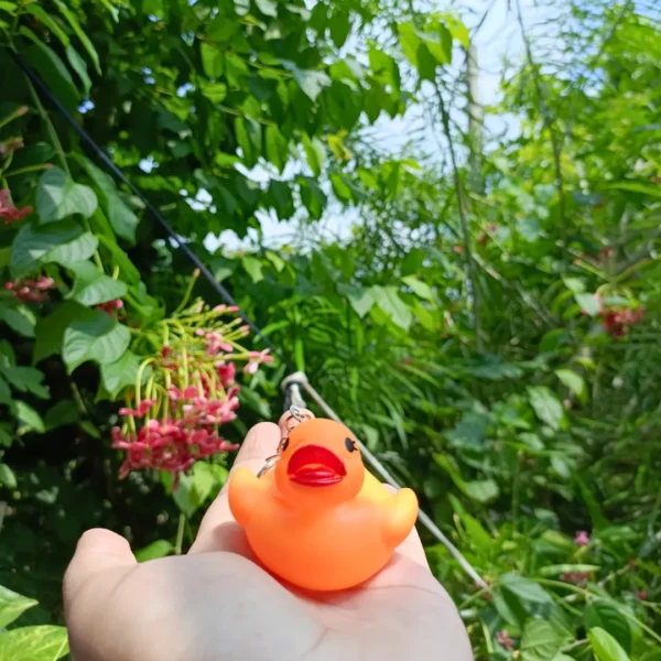 Ducky Keychain featuring a cute and colorful design of a duck.