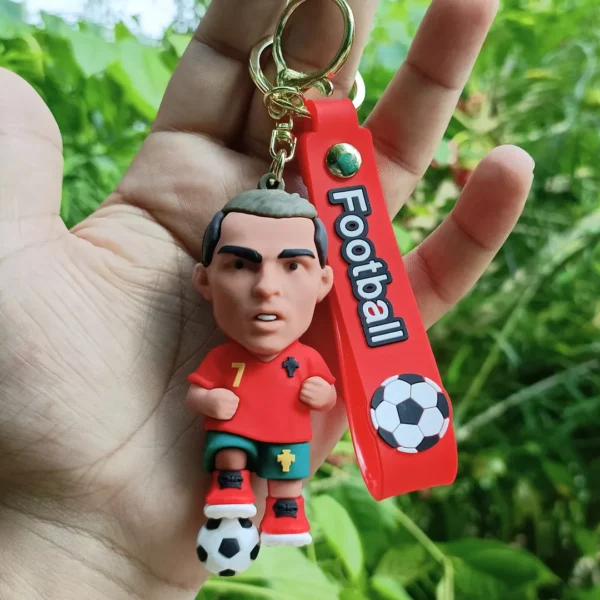 Ronaldo 3D Keychain in red featuring a detailed design of the football player.