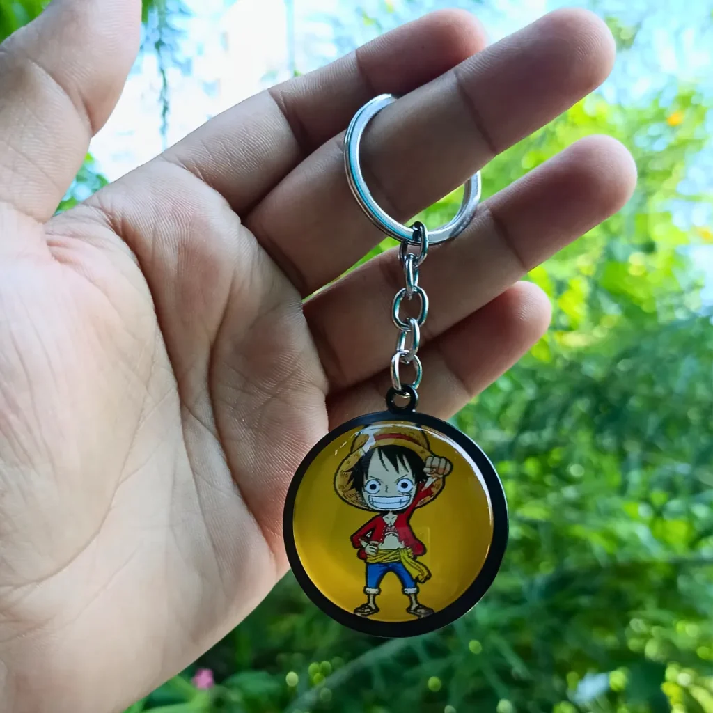 Luffy Double-Sided Keychain featuring vibrant designs of the character on both sides